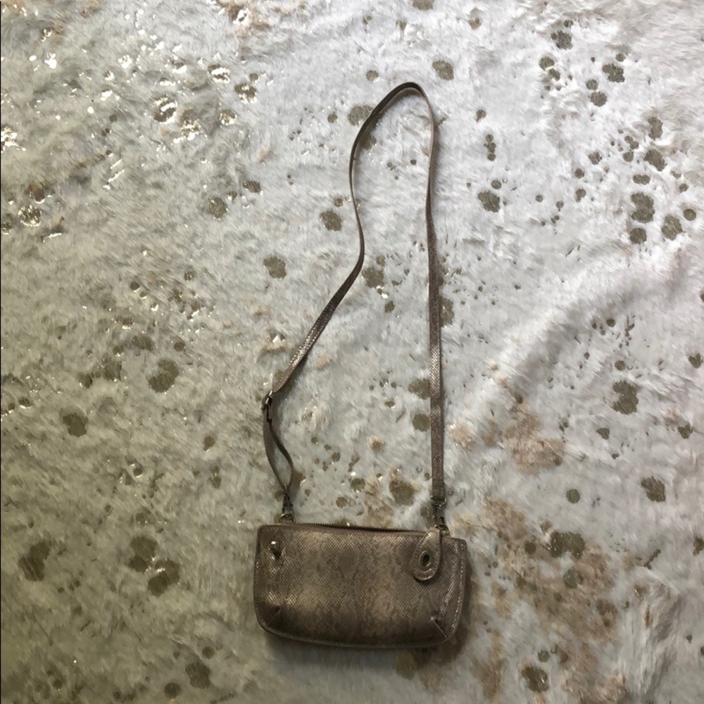 Crossbody/wristlet handbag.